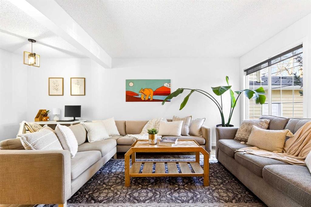 77 Point Drive Nw, Calgary, AB - Indoor Photo Showing Living Room