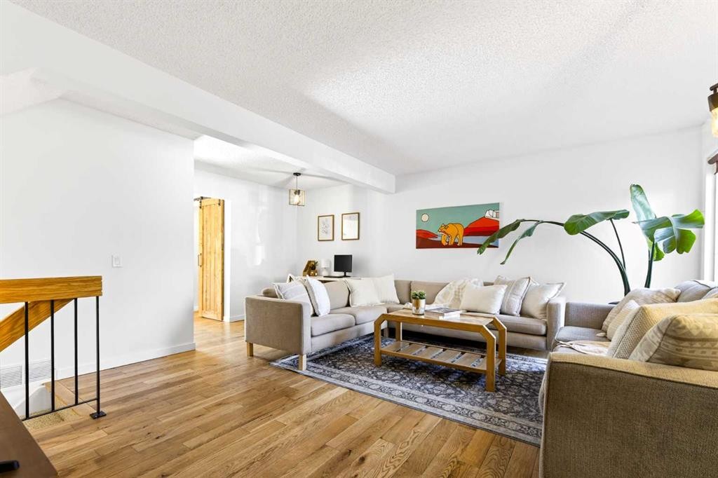 77 Point Drive Nw, Calgary, AB - Indoor Photo Showing Living Room