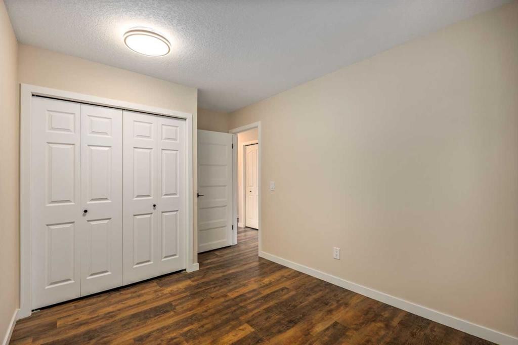 131 Stratton Crescent Sw, Calgary, AB - Indoor Photo Showing Other Room