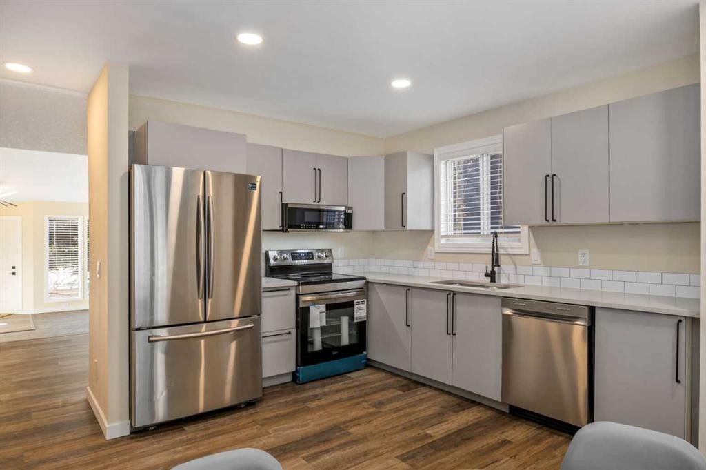 131 Stratton Crescent Sw, Calgary, AB - Indoor Photo Showing Kitchen With Stainless Steel Kitchen