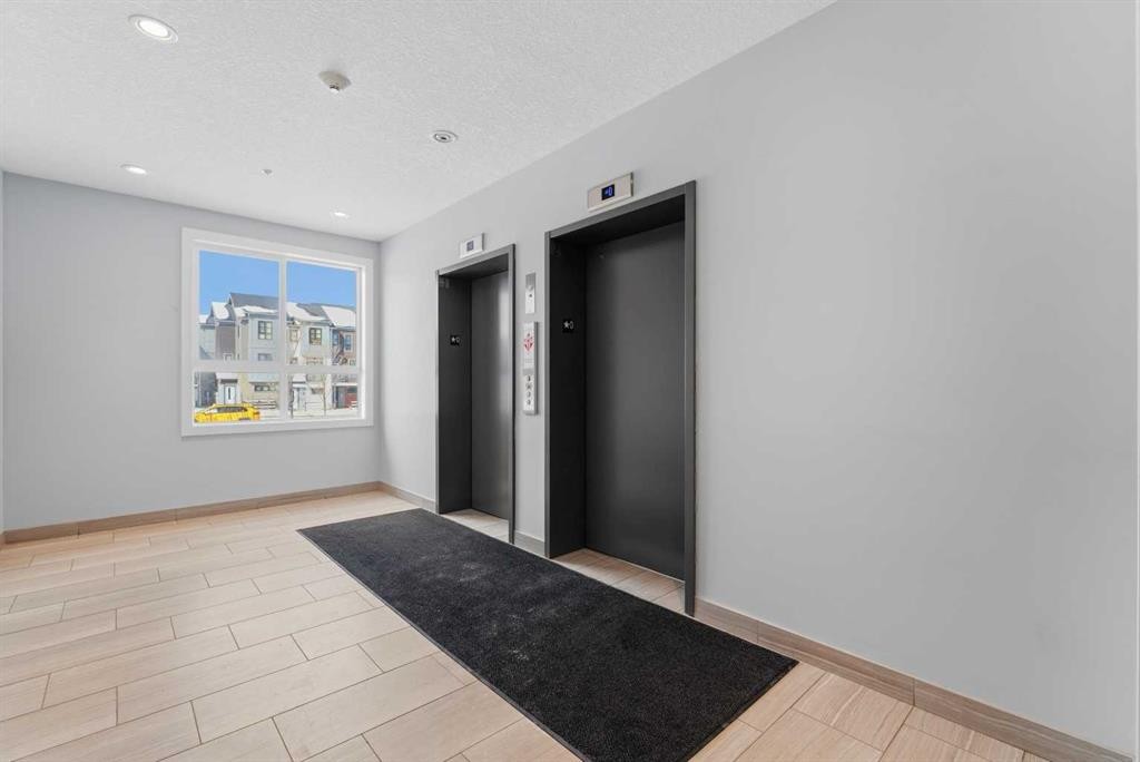 213-20 Walgrove Walk Se, Calgary, AB - Indoor Photo Showing Other Room