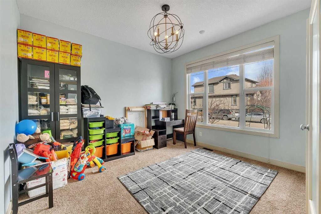 156 Bishop Crescent Nw, Langdon, AB - Indoor Photo Showing Other Room