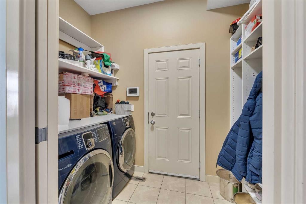 156 Bishop Crescent Nw, Langdon, AB - Indoor Photo Showing Laundry Room