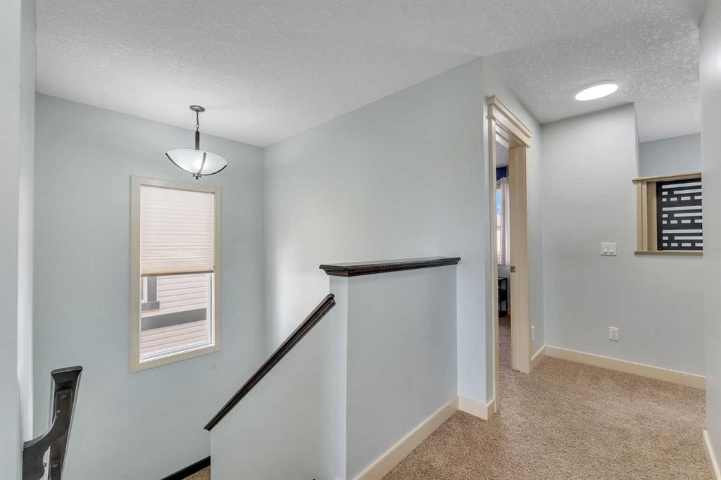 156 Bishop Crescent Nw, Langdon, AB - Indoor Photo Showing Other Room