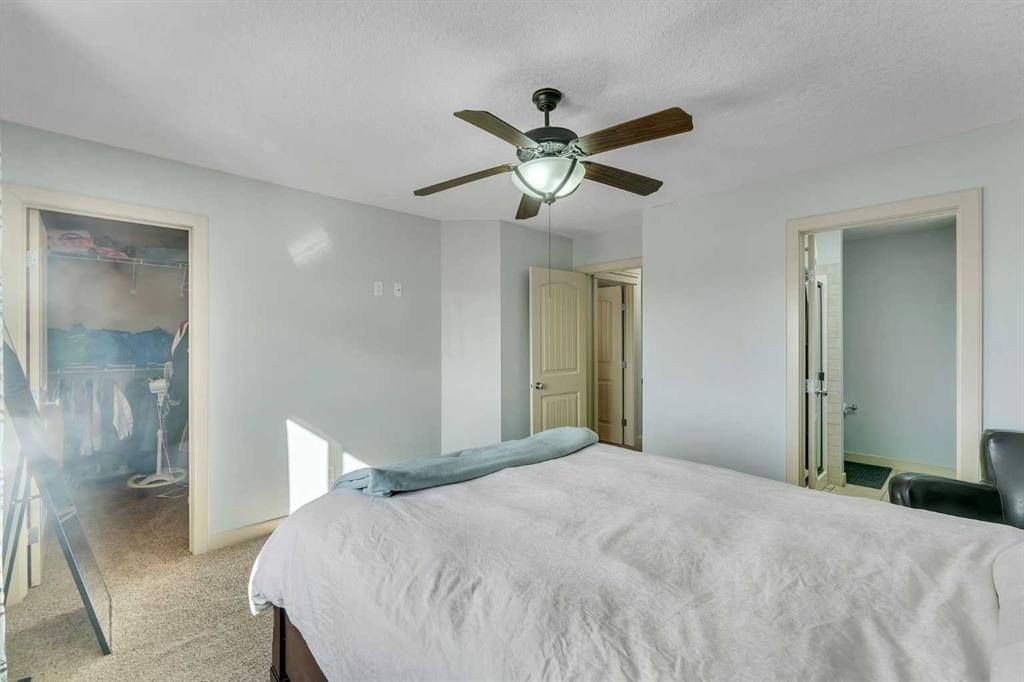 156 Bishop Crescent Nw, Langdon, AB - Indoor Photo Showing Bedroom