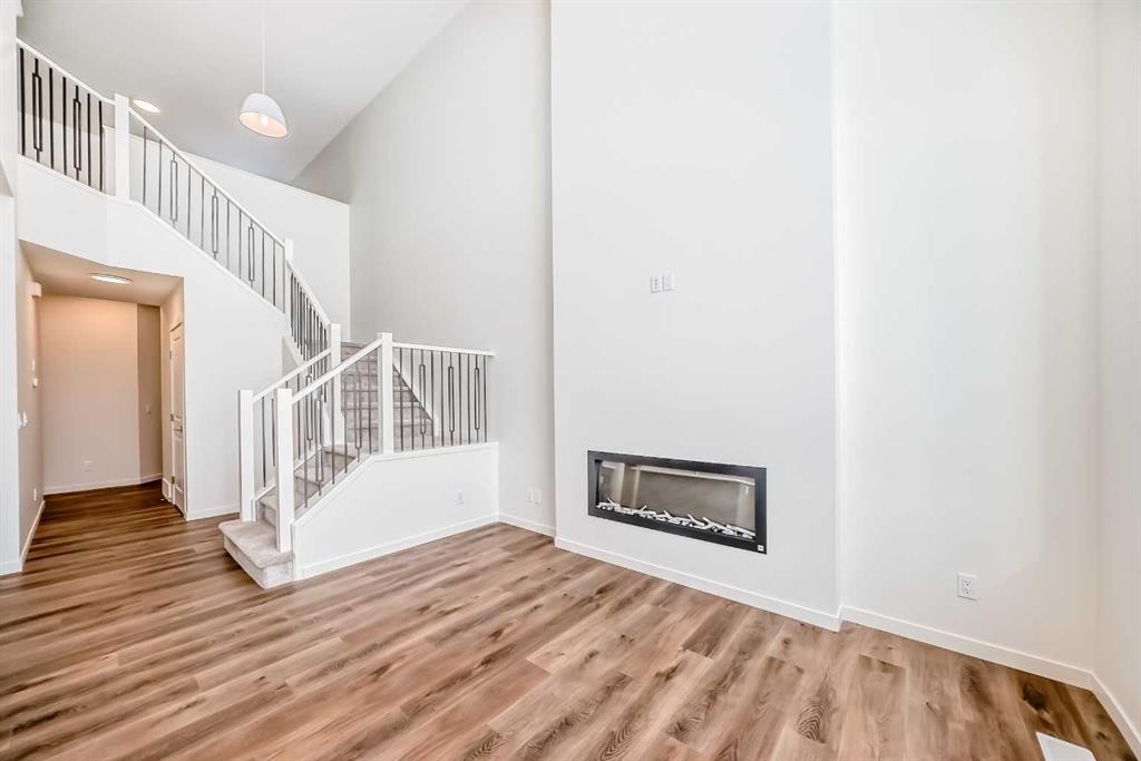 23 Bartlett Crescent Se, Calgary, AB - Indoor With Fireplace