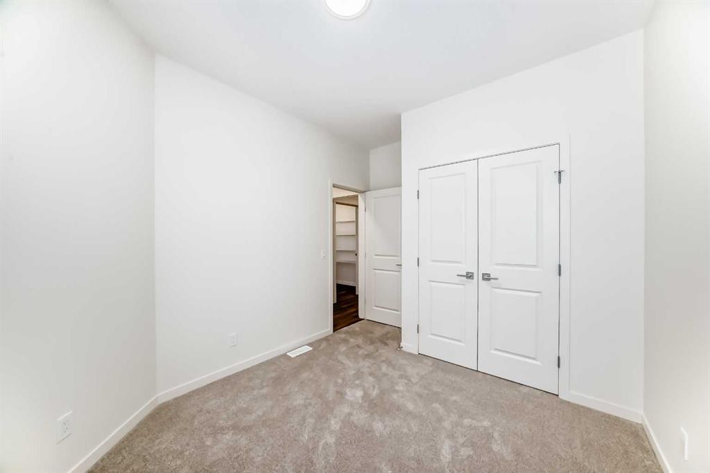 23 Bartlett Crescent Se, Calgary, AB - Indoor Photo Showing Other Room