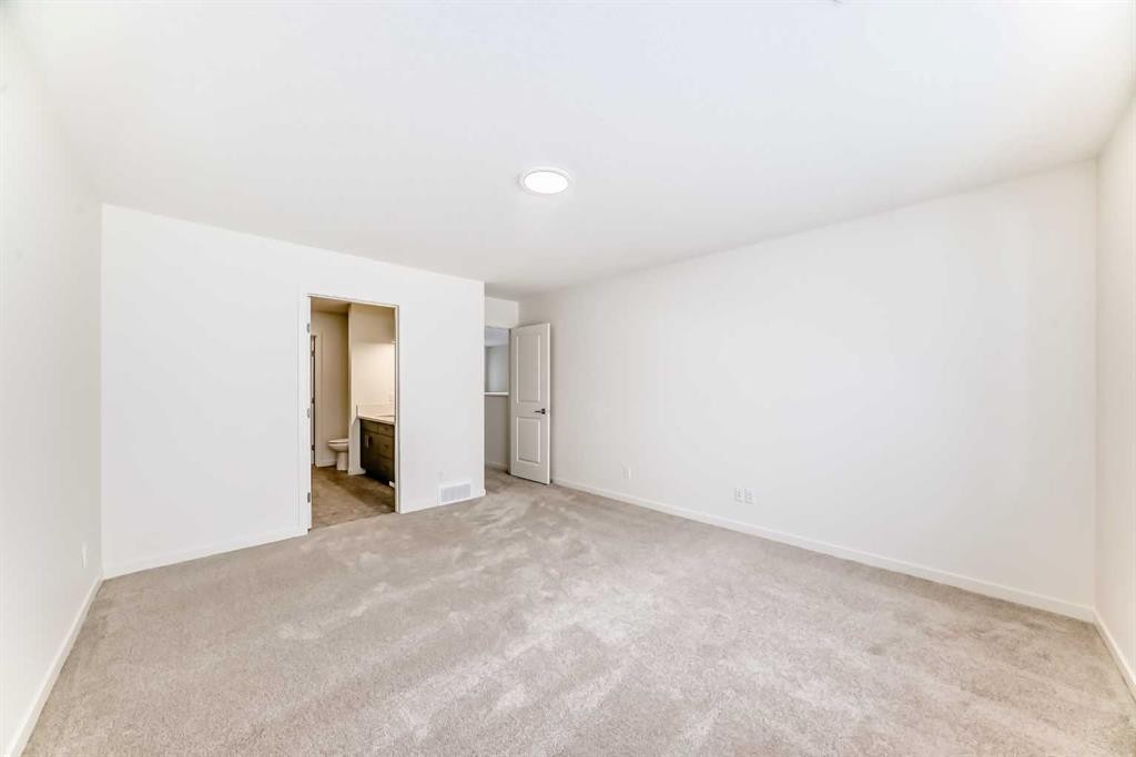 23 Bartlett Crescent Se, Calgary, AB - Indoor Photo Showing Other Room