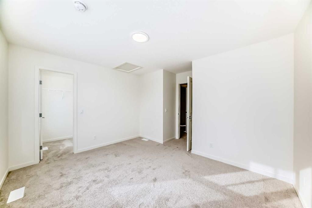 23 Bartlett Crescent Se, Calgary, AB - Indoor Photo Showing Other Room