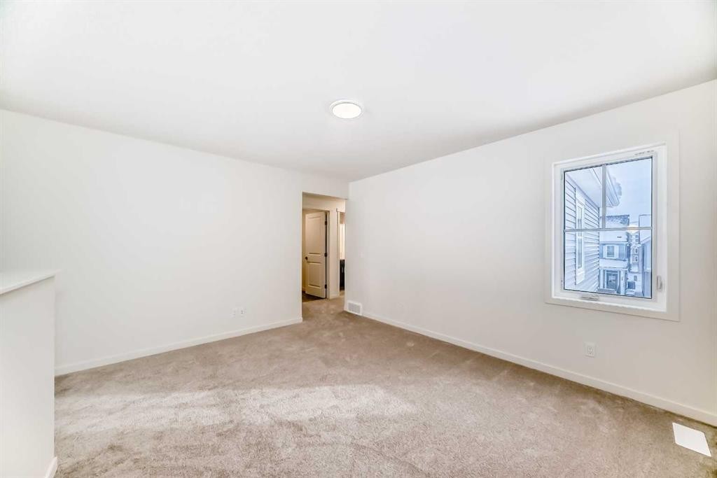 23 Bartlett Crescent Se, Calgary, AB - Indoor Photo Showing Other Room