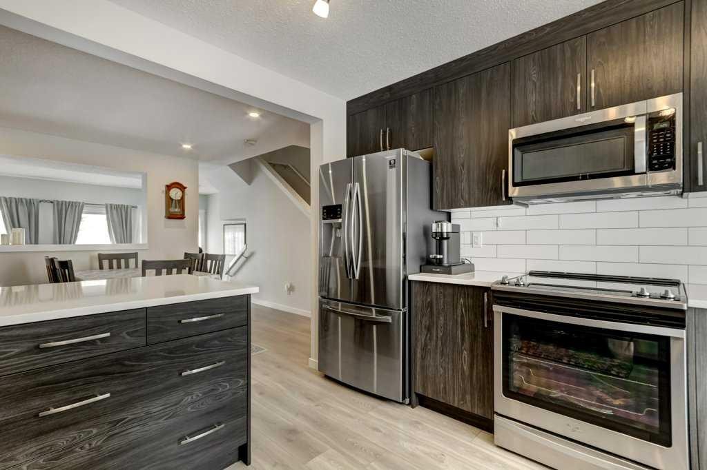 210 Cranbrook Square Se, Calgary, AB - Indoor Photo Showing Kitchen With Stainless Steel Kitchen With Upgraded Kitchen