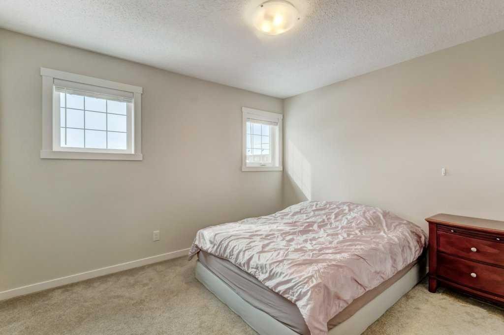 210 Cranbrook Square Se, Calgary, AB - Indoor Photo Showing Bedroom
