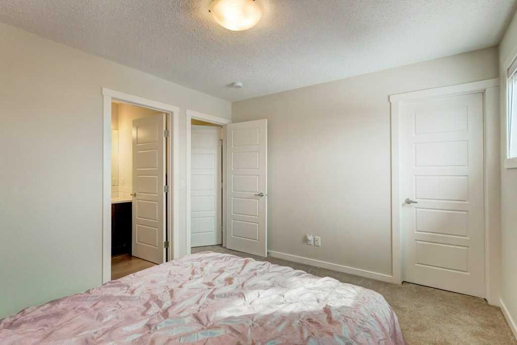 210 Cranbrook Square Se, Calgary, AB - Indoor Photo Showing Bedroom