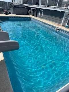 392 Rainbow Falls Way, Chestermere, AB - Outdoor With In Ground Pool