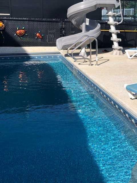 392 Rainbow Falls Way, Chestermere, AB - Outdoor With In Ground Pool