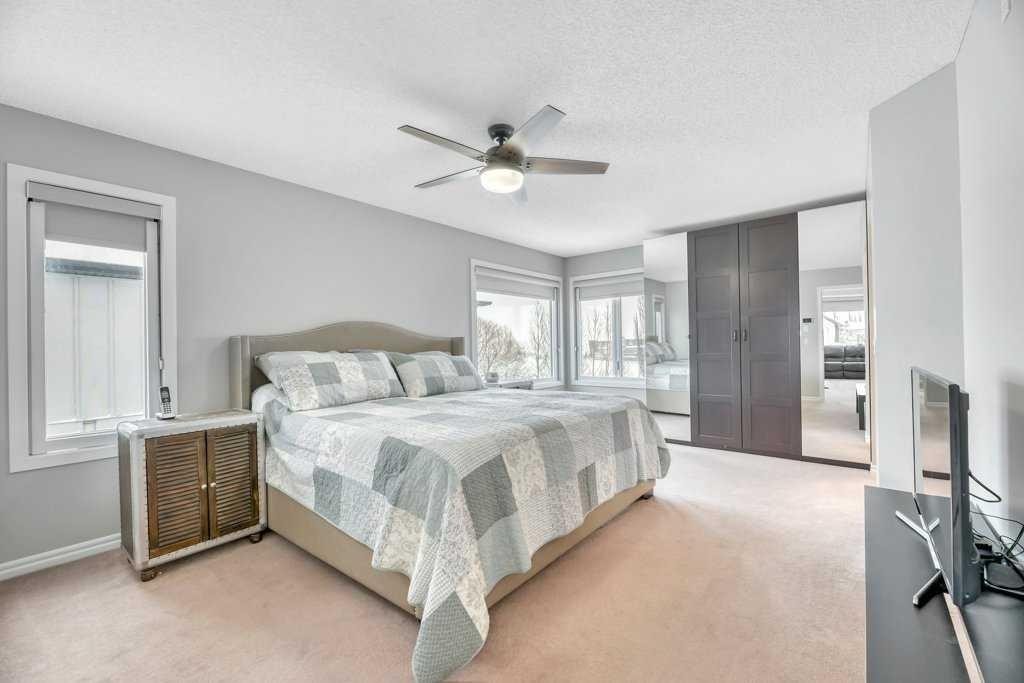 392 Rainbow Falls Way, Chestermere, AB - Indoor Photo Showing Bedroom