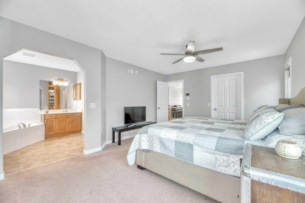 392 Rainbow Falls Way, Chestermere, AB - Indoor Photo Showing Bedroom