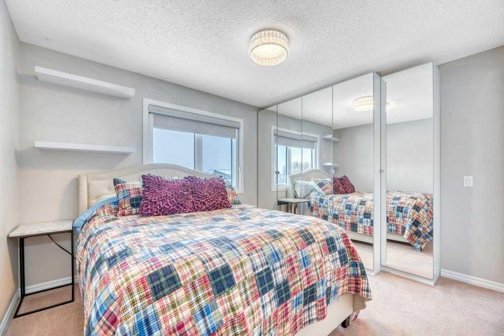 392 Rainbow Falls Way, Chestermere, AB - Indoor Photo Showing Bedroom