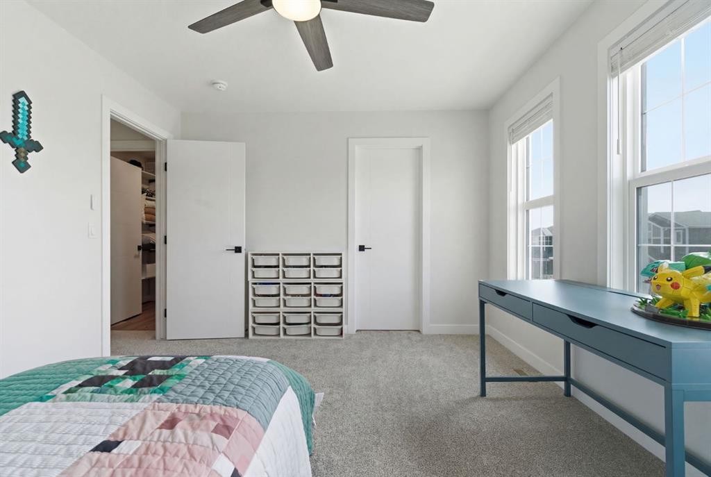 117 Ranchers View, Okotoks, AB - Indoor Photo Showing Bedroom