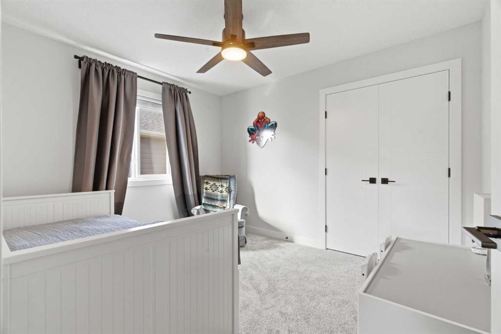 117 Ranchers View, Okotoks, AB - Indoor Photo Showing Bedroom
