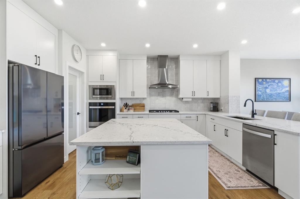 117 Ranchers View, Okotoks, AB - Indoor Photo Showing Kitchen With Stainless Steel Kitchen With Upgraded Kitchen