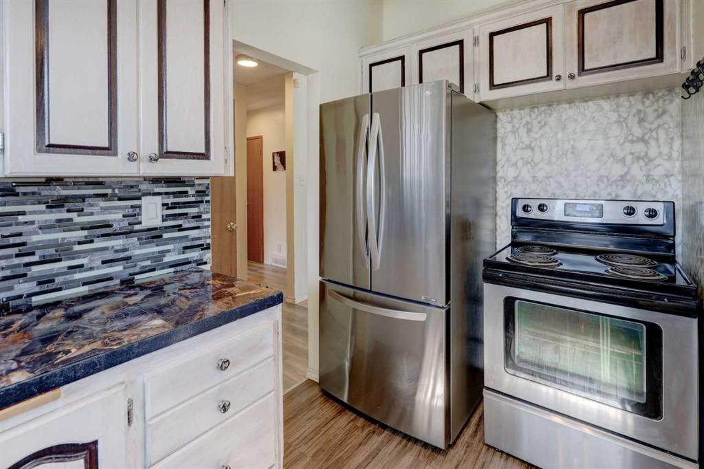 4721 Edmonton Trail Ne, Calgary, AB - Indoor Photo Showing Kitchen With Stainless Steel Kitchen