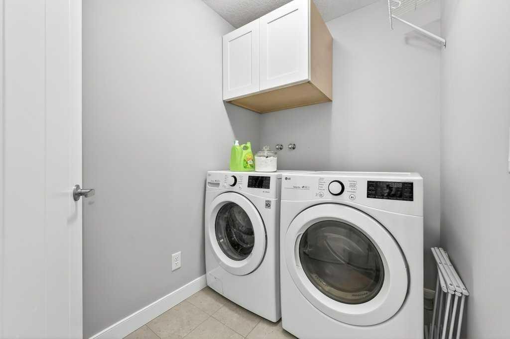 92 Fireside Crescent, Cochrane, AB - Indoor Photo Showing Laundry Room