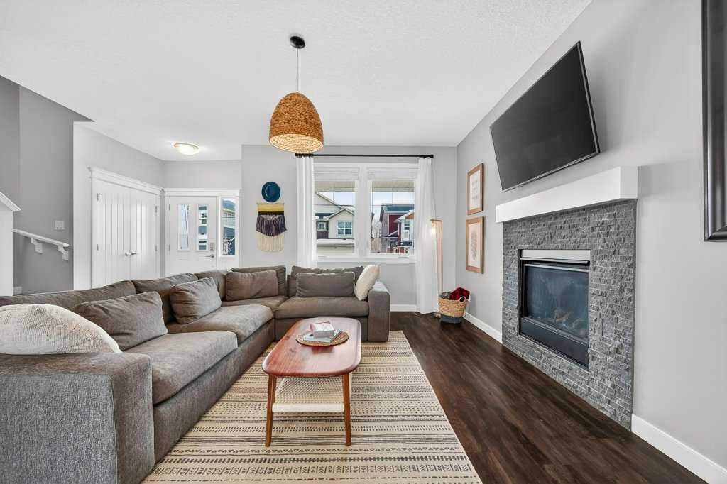 92 Fireside Crescent, Cochrane, AB - Indoor Photo Showing Living Room With Fireplace