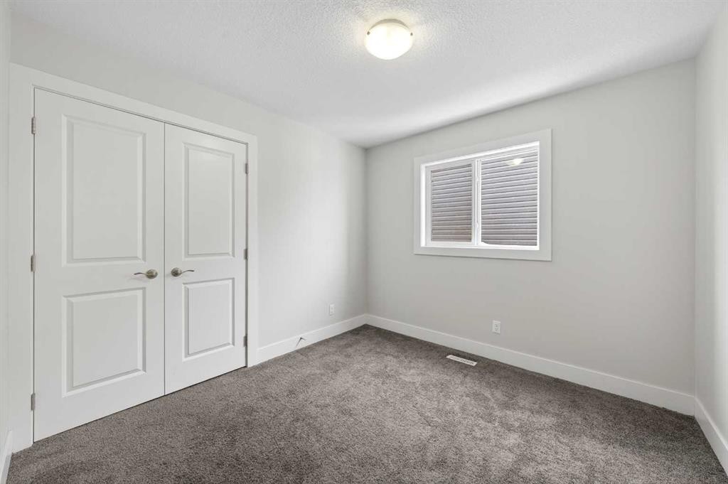 14 Evansfield Road Nw, Calgary, AB - Indoor Photo Showing Other Room