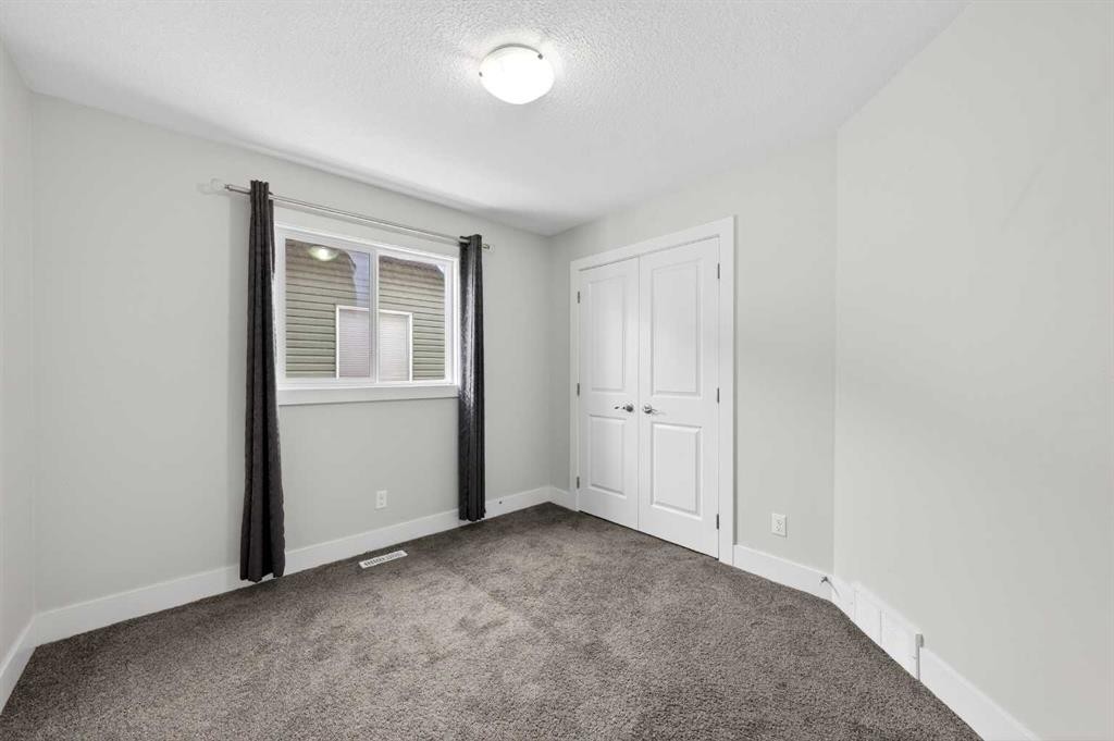 14 Evansfield Road Nw, Calgary, AB - Indoor Photo Showing Other Room