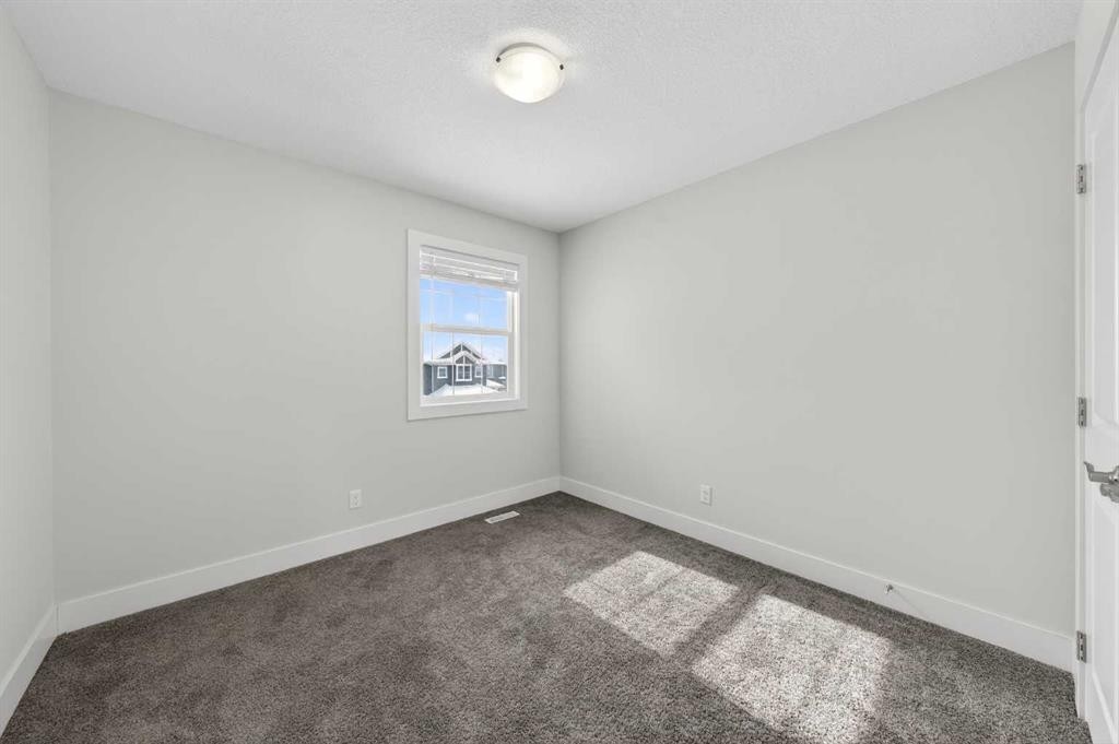 14 Evansfield Road Nw, Calgary, AB - Indoor Photo Showing Other Room