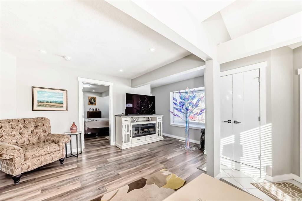 6403 35 Avenue Nw, Calgary, AB - Indoor Photo Showing Living Room With Fireplace