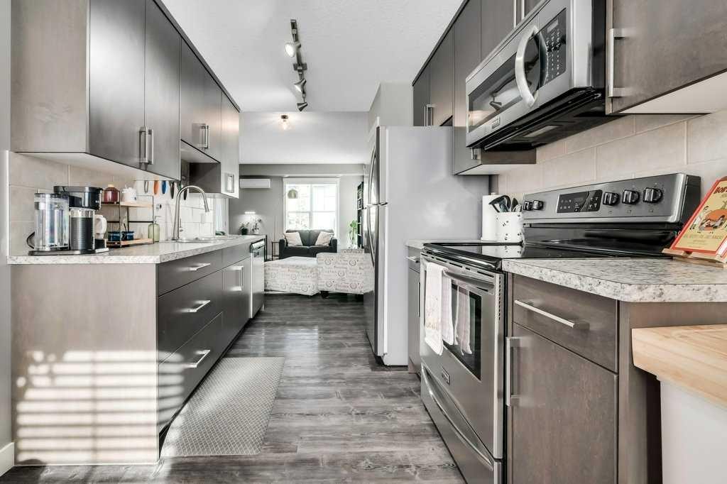 160 Cranford Walk Se, Calgary, AB - Indoor Photo Showing Kitchen