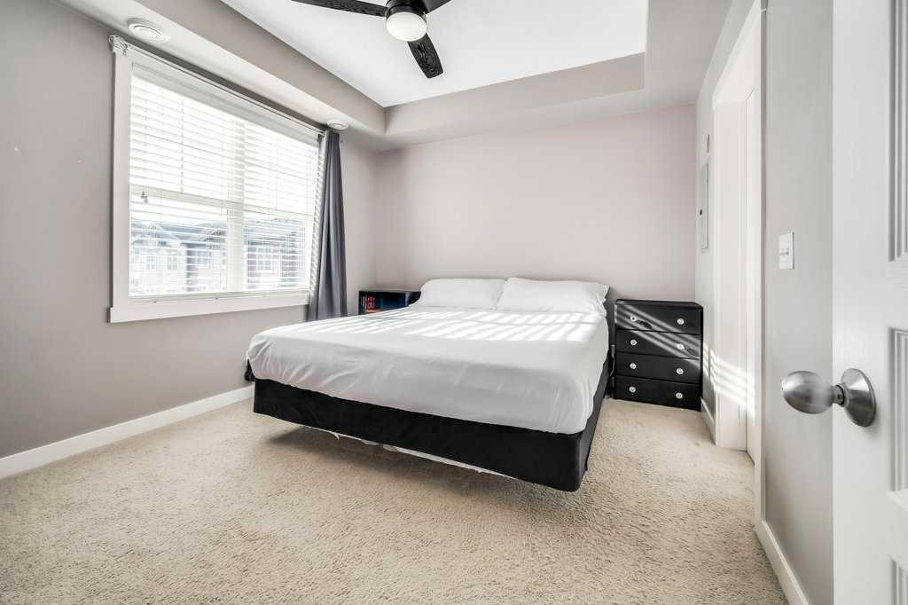 160 Cranford Walk Se, Calgary, AB - Indoor Photo Showing Bedroom