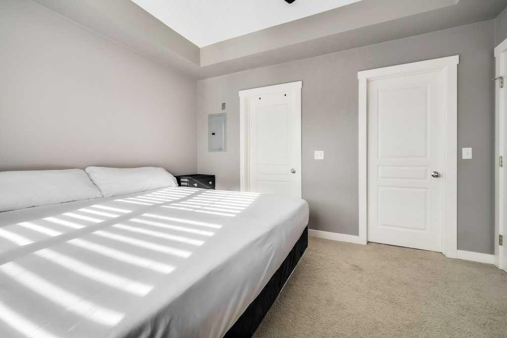 160 Cranford Walk Se, Calgary, AB - Indoor Photo Showing Bedroom