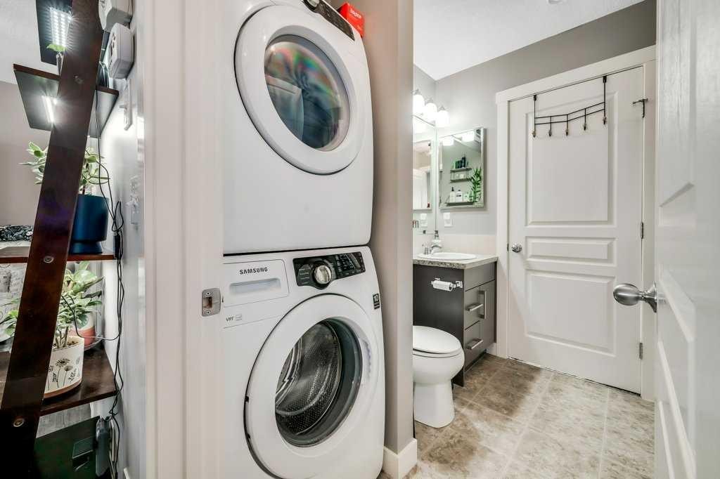 160 Cranford Walk Se, Calgary, AB - Indoor Photo Showing Laundry Room