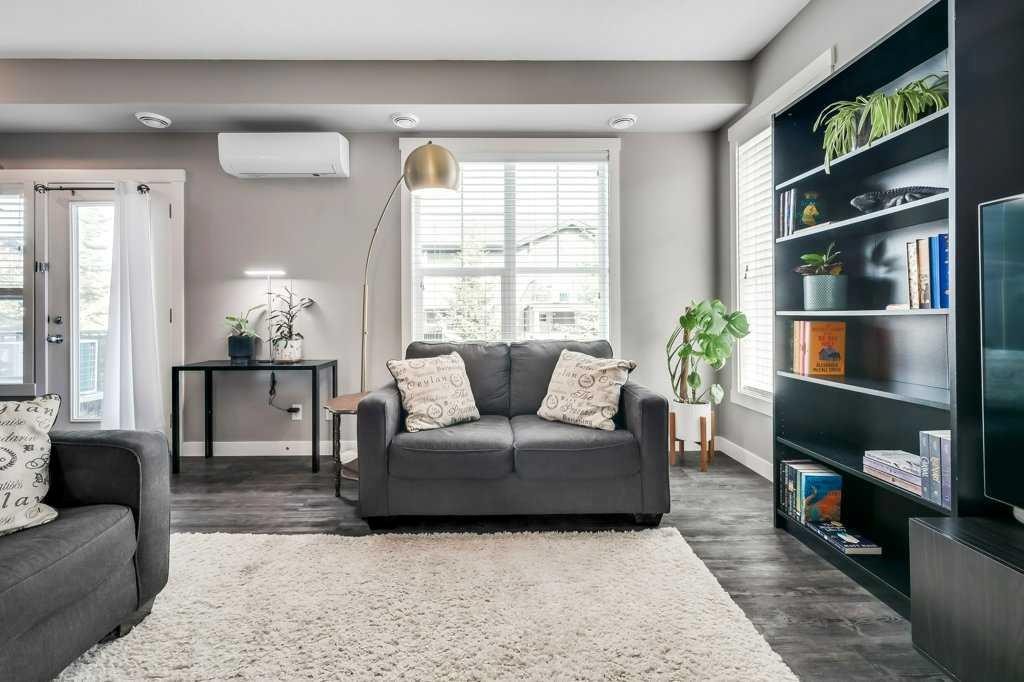 160 Cranford Walk Se, Calgary, AB - Indoor Photo Showing Living Room