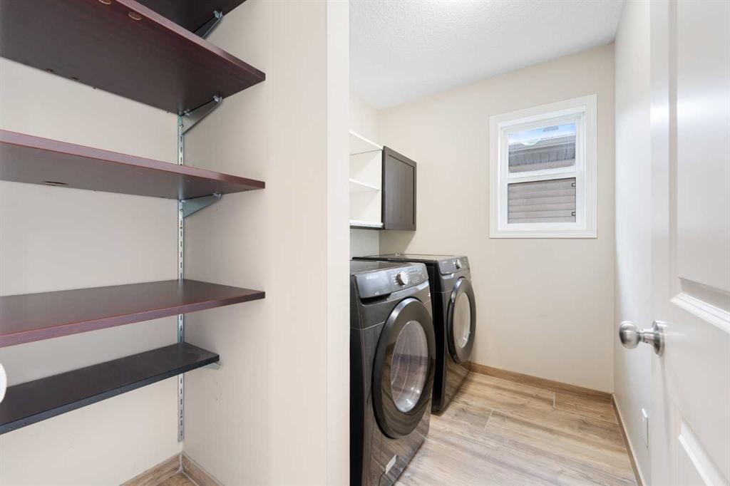 220 Walden Heights Se, Calgary, AB - Indoor Photo Showing Laundry Room