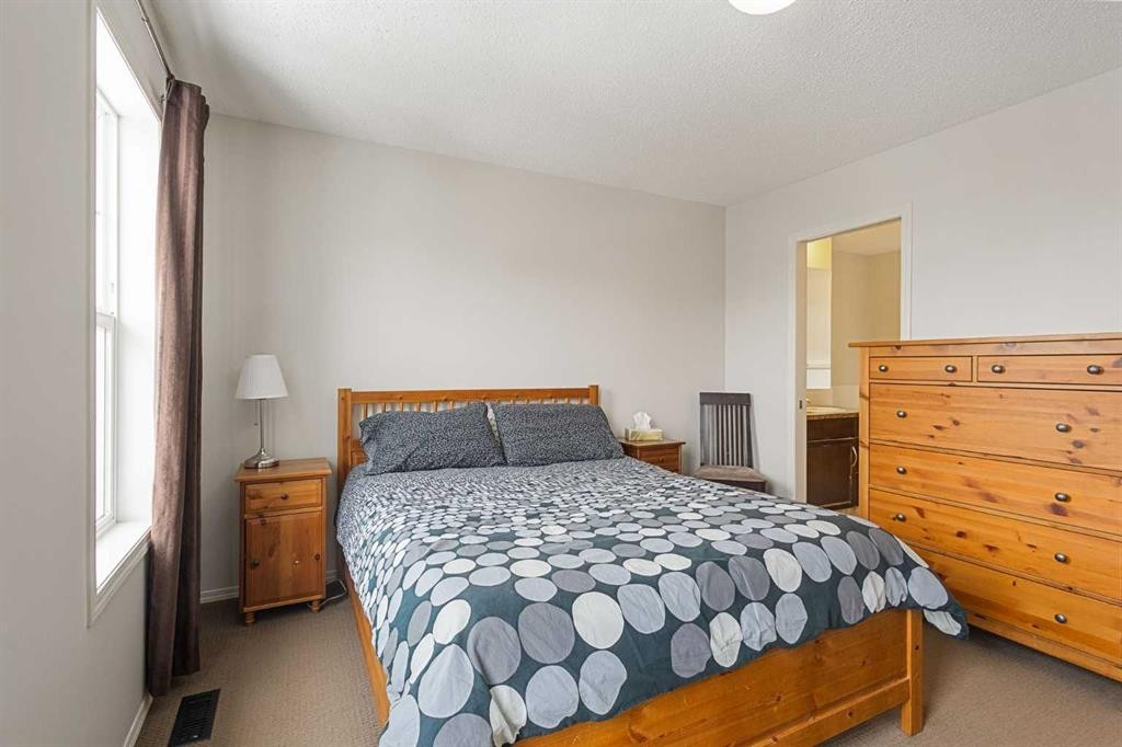 41 Silverado Saddle Avenue Sw, Calgary, AB - Indoor Photo Showing Bedroom