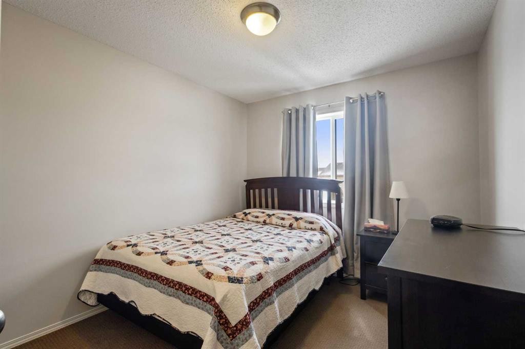 41 Silverado Saddle Avenue Sw, Calgary, AB - Indoor Photo Showing Bedroom