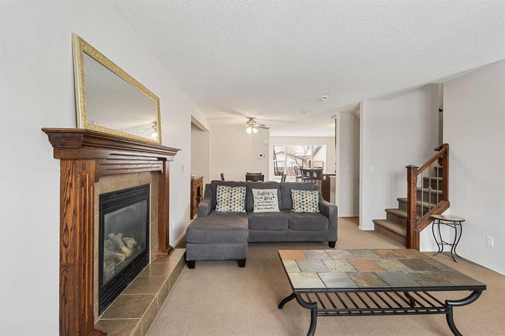 41 Silverado Saddle Avenue Sw, Calgary, AB - Indoor Photo Showing Living Room With Fireplace
