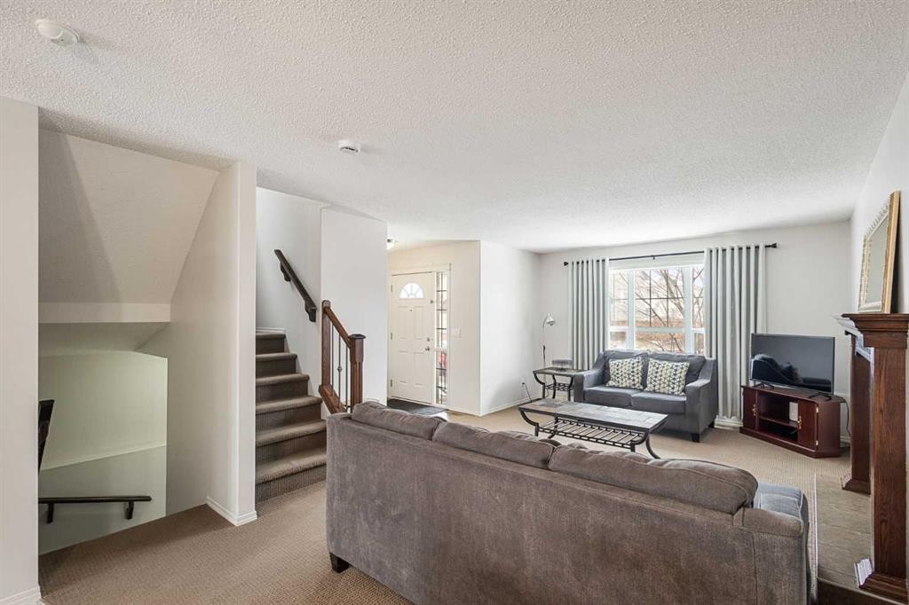 41 Silverado Saddle Avenue Sw, Calgary, AB - Indoor Photo Showing Living Room
