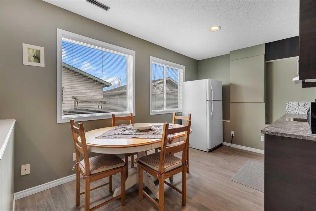 34 Hidden Spring Circle Nw, Calgary, AB - Indoor Photo Showing Dining Room