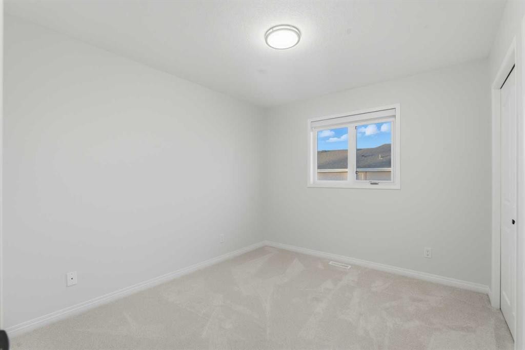 146 Springbluff Heights Sw, Calgary, AB - Indoor Photo Showing Other Room
