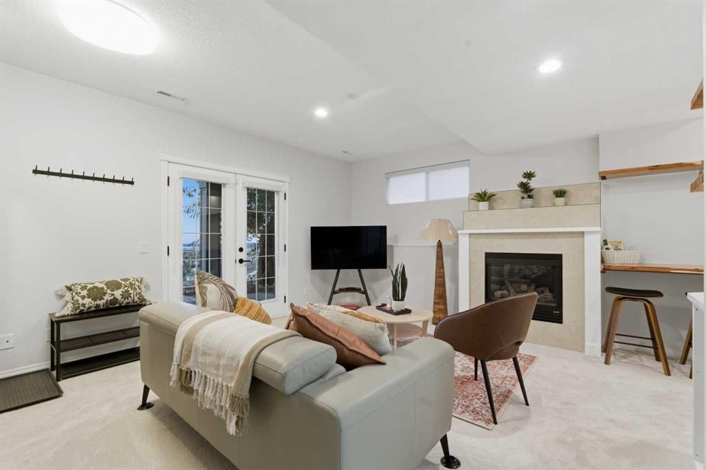 146 Springbluff Heights Sw, Calgary, AB - Indoor With Fireplace