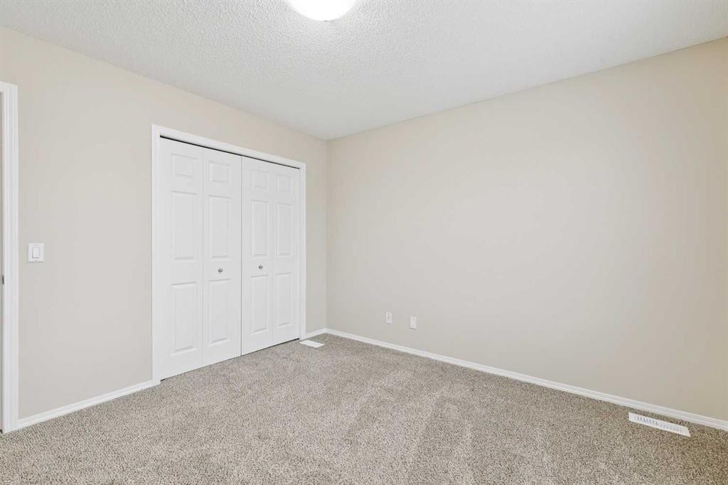 475 Cimarron Boulevard, Okotoks, AB - Indoor Photo Showing Other Room