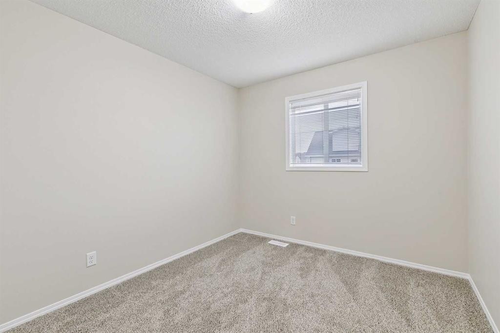 475 Cimarron Boulevard, Okotoks, AB - Indoor Photo Showing Other Room