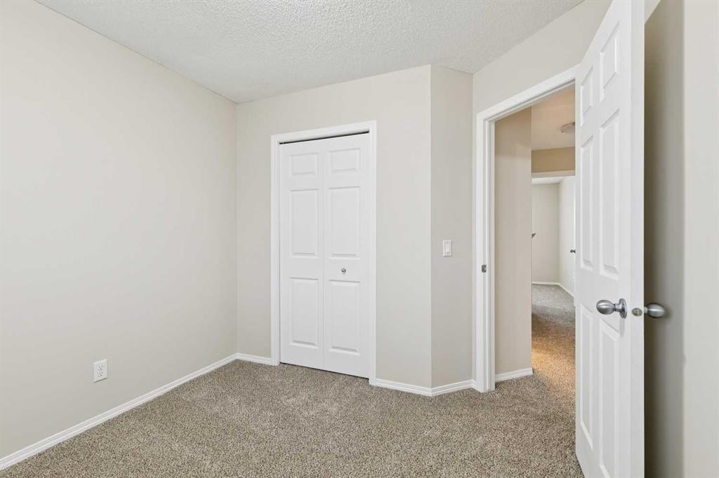 475 Cimarron Boulevard, Okotoks, AB - Indoor Photo Showing Other Room
