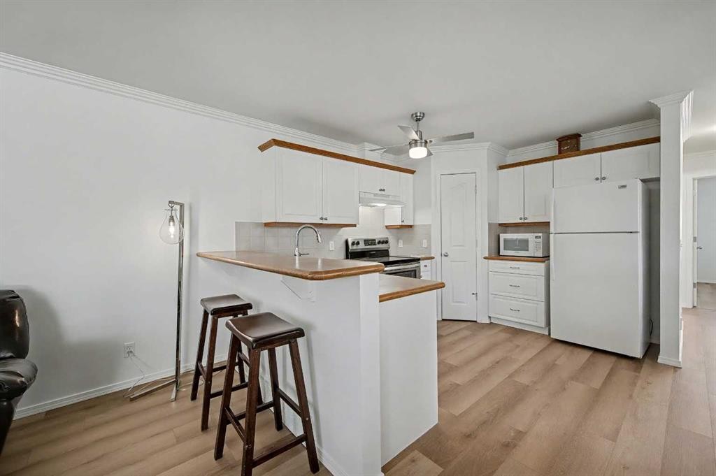 1409 Strathcona Way, Strathmore, AB - Indoor Photo Showing Kitchen