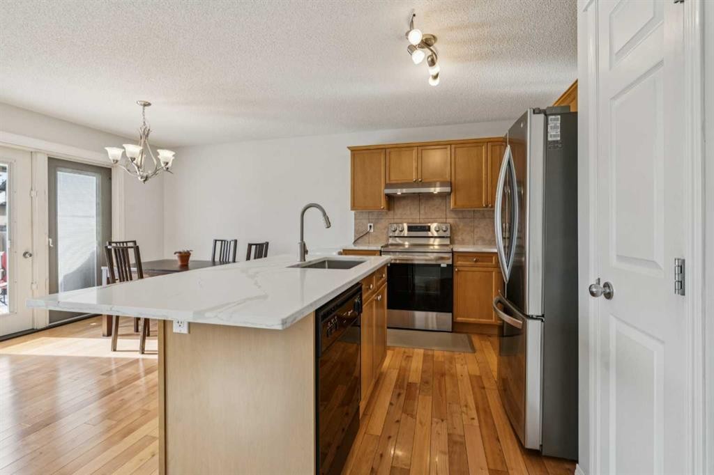 85 Silverado Range View Sw, Calgary, AB - Indoor Photo Showing Kitchen With Stainless Steel Kitchen With Upgraded Kitchen